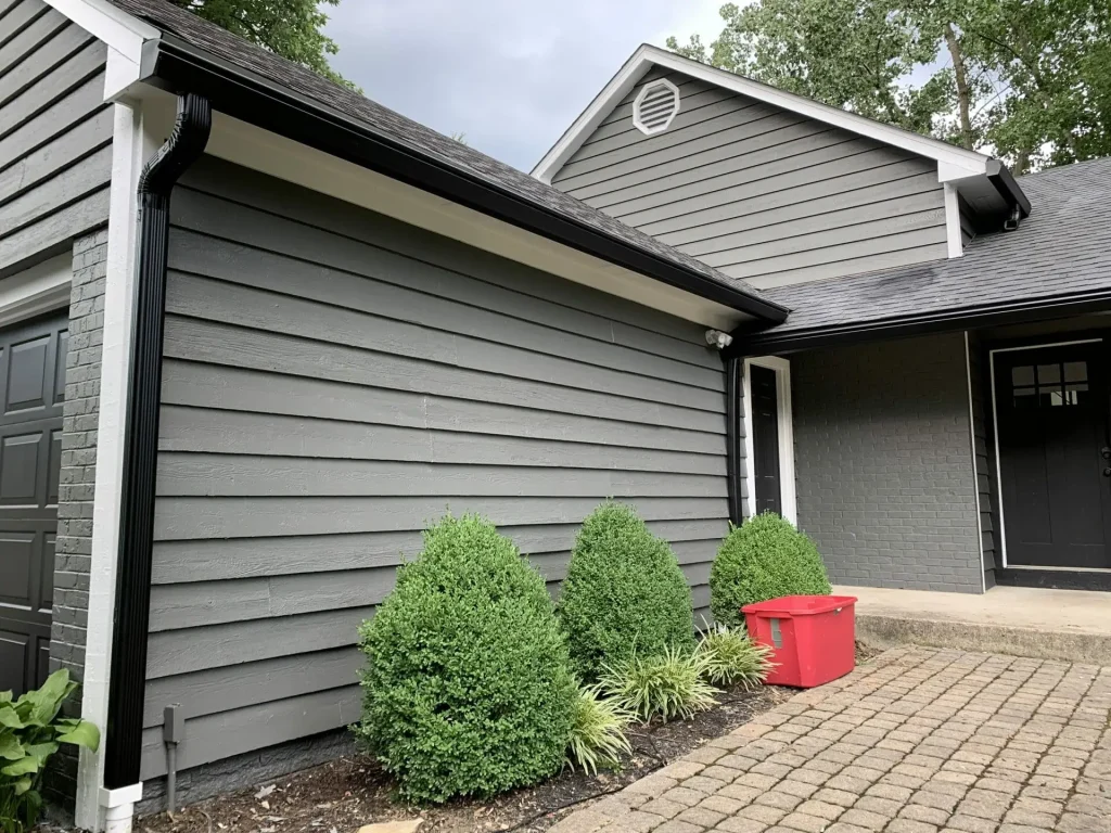 K-Guard gutters on a gray two-story home