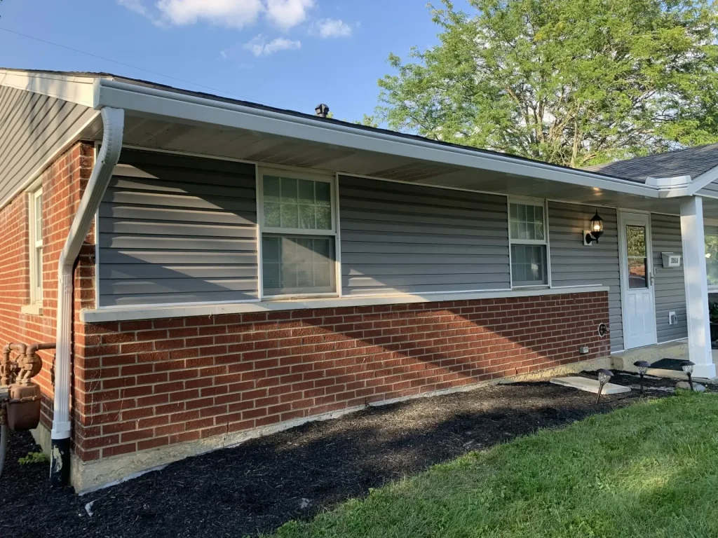 Brick and siding home with K-Guard gutters