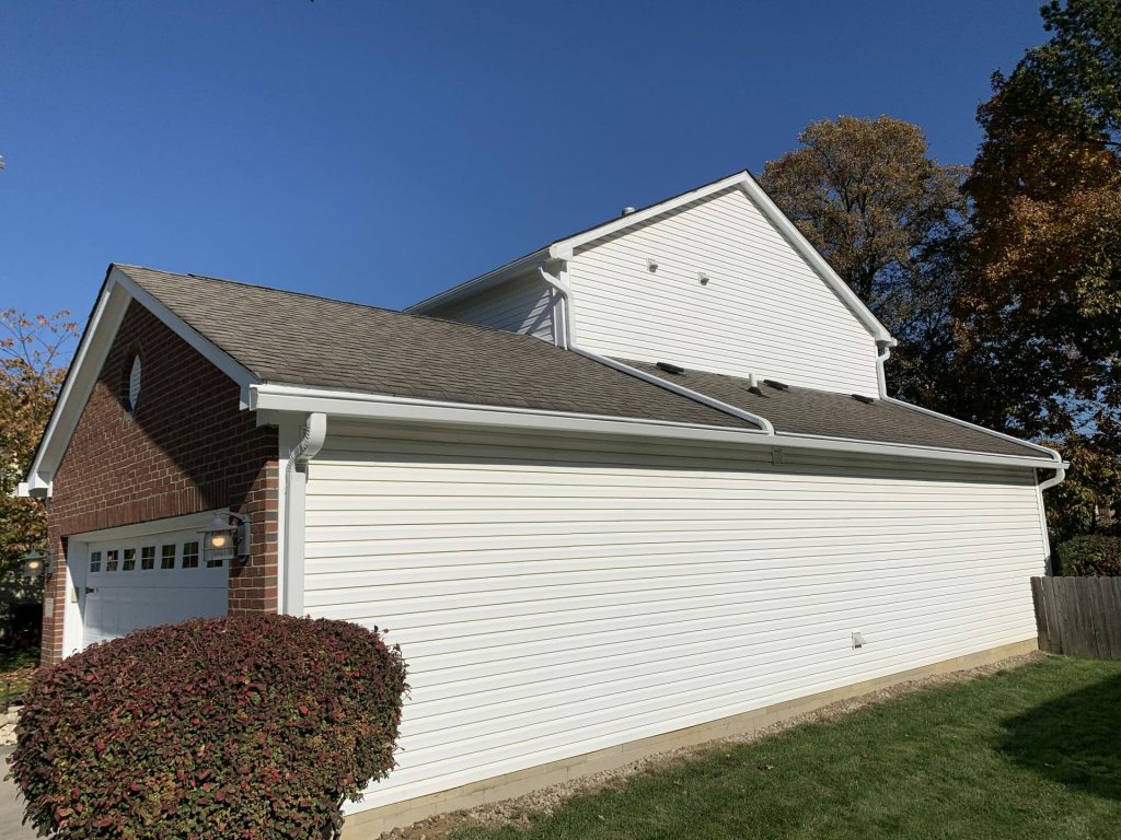 White garage roofline with K-Guard gutters