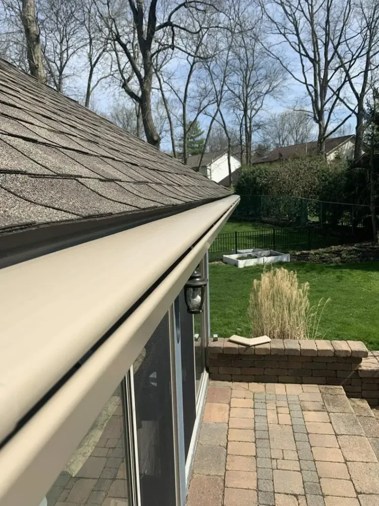 K-Guard gutter and hood close-up along the roofline