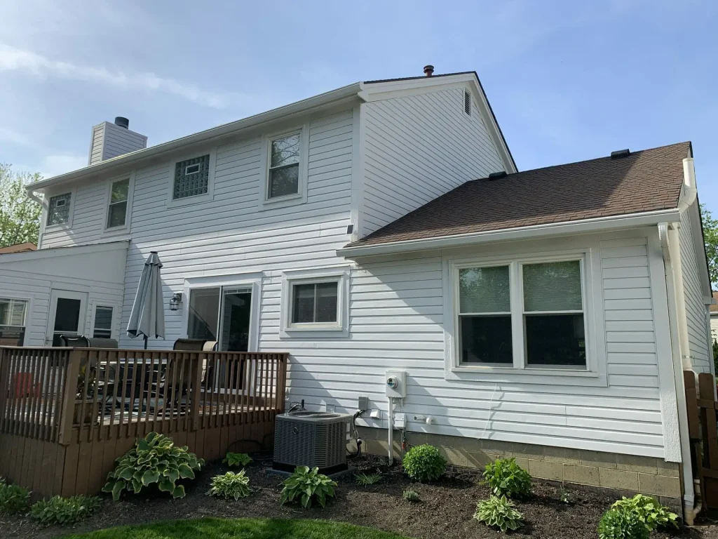 White home and deck with K-Guard gutters