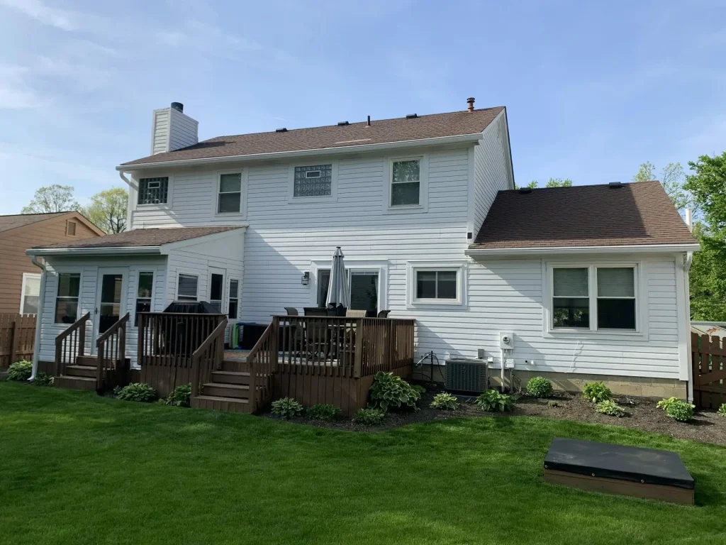 Back of a white two-story home with K-Guard gutters