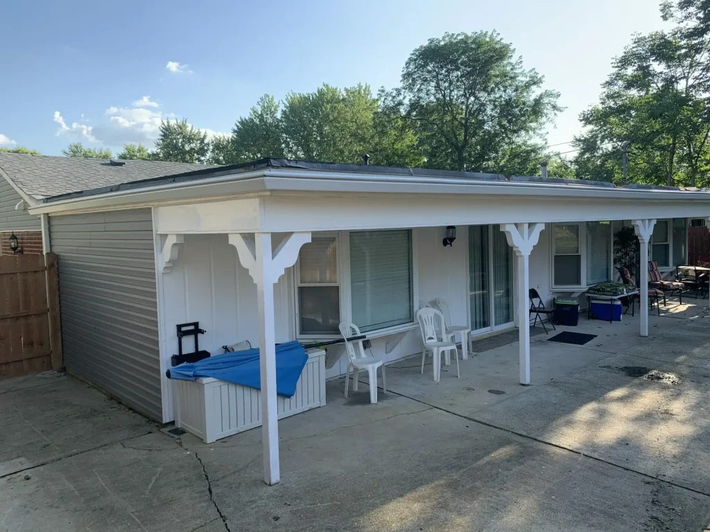 Covered patio roof with K-Guard gutters
